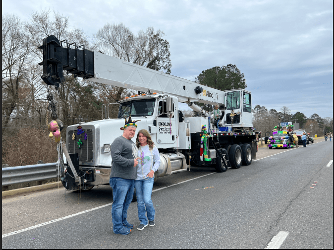 Bordelon's crane truck in a local Mardi Gras community event